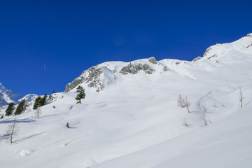 Fototapeta na wymiar Österreichische Berglandschaft im Lungau im Winter