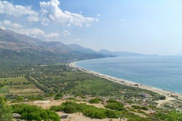 Albanian Riviera, Borsh Beach on the Ionian Sea coast on a sunny summer day. An undiscovered beautiful place in Europe. View from above.