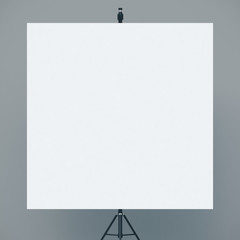 Blank white flipchart in room