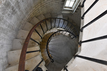 Obraz premium Circular staircase and railing inside lighthouse