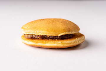  Dorayaki is a type of Japanese confection, a red-bean pancake which consists of two small pancake-like patties made from castella wrapped around red bean paste. 