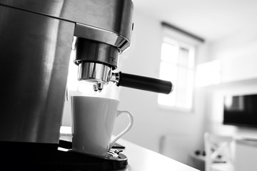 Close-up of making coffee in a coffee machine.