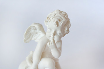 beautiful little angel boy on white background love romance concept