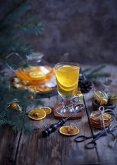 Winter tea with fresh  orange . Cup of orange tea. Oriental tea. orange tea.