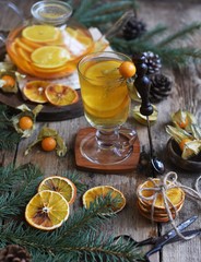 Winter tea with fresh  orange . Cup of orange tea. Oriental tea. orange tea.