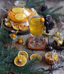 Winter tea with fresh  orange . Cup of orange tea. Oriental tea. orange tea.