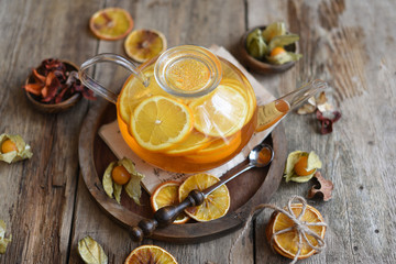 Winter tea with fresh  orange . Cup of orange tea. Oriental tea. orange tea.