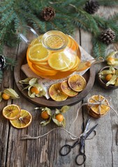 Winter tea with fresh  orange . Cup of orange tea. Oriental tea. orange tea.