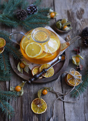 Fototapeta na wymiar Winter tea with fresh orange . Cup of orange tea. Oriental tea. orange tea.
