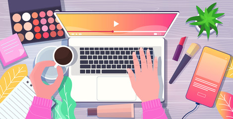 beauty blogger hands using laptop at workplace smartphone cosmetics coffee cup on desk social media network blogging concept top angle view horizontal vector illustration