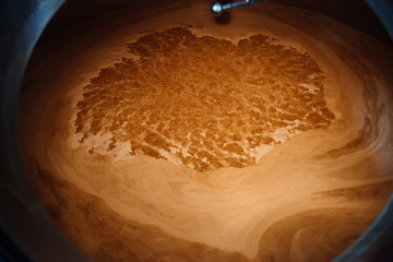Brewing process inside the vat, close up