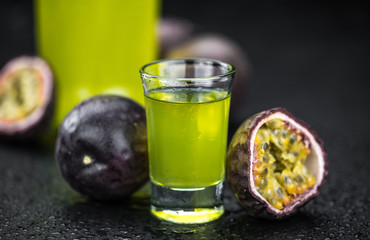 Fresh Passion Fruit Liqueur as detailed close-up shot (selective focus)