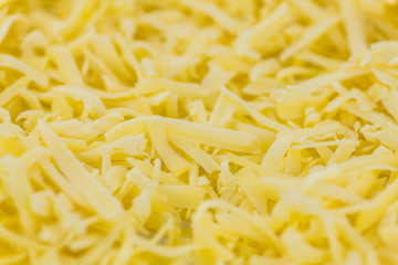 Fresh made Grated Cheese (close-up shot)