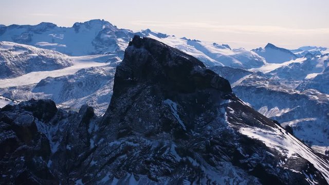 Black Tusk peak near Whistler BC shot close up in a plane. This Aerial shot shows the beauty of Whistler's mountains and nature.