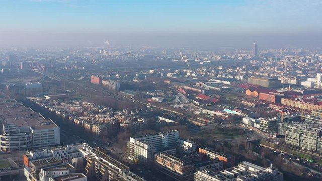 aerial view Paris Saint Denis polluted air greenhouse gas industry chimney smoking France capital 