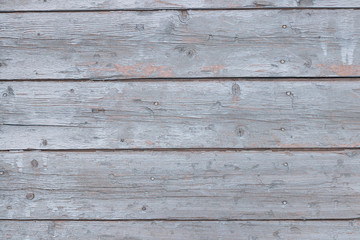 Obraz na płótnie Canvas Background - wooden rough boards with peeling gray-blue paint