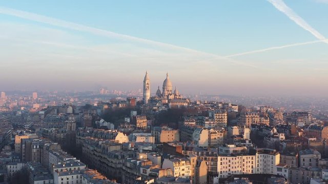 aerial view of paris Montmartre neighbourhood Basilica of the Sacred Heart France sunset 