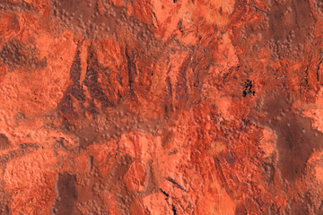 Bright relief seamless texture in red and pink tones with veins and scratches, seamless pattern