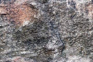 Stony relief seamless texture in grey and pink tones with potholes and bumps, seamless pattern 