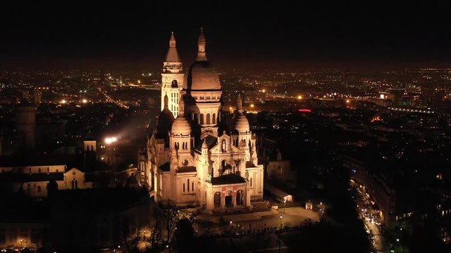 Night view of Basilica of the Sacred Heart of Paris aerial shot France butte Montmartre