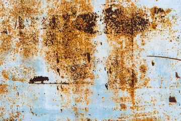 Rusty and scratched metal texture. Brown rusted iron on blue metal background.