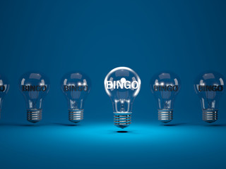 Illuminated sign BINGO inside light bulbs. Lottery concept