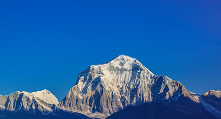 Fototapeta premium Snow-covered Mountain With Blue Sky, Cloud and Fog