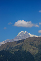 Snow-covered Mountain With Blue Sky, Cloud and Fog