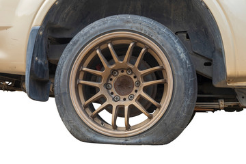 Fototapeta na wymiar Close up old tire and flat tire on back car isolated on white background. Save with clipping path. Tire leak.