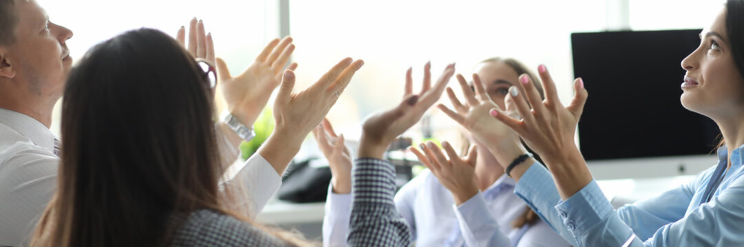 Team of business people raise hand from office background. Network marketing concept. Prejudice at work calling meme.