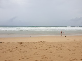 couple walking on beach