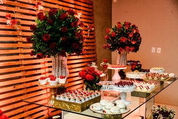 christmas table setting, table with cake and sweets,  chocolate truffles, brigadeiro, chocolate sprinkles, chocolate candy, condensed milk candy balls, candy balls, sweets table	