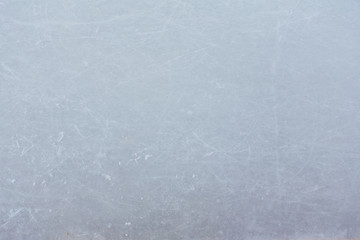 Ice hockey rink scratches surface abstract background.