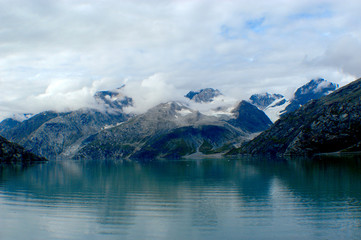 Obraz na płótnie Canvas A panoramic view of Glacier Bay, Alaska, coming through the Inside Passage to view the calving of the glaciers. 