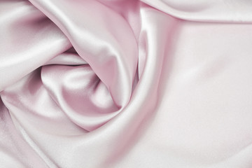 Draped satin and silk pink fabric for festive backgrounds