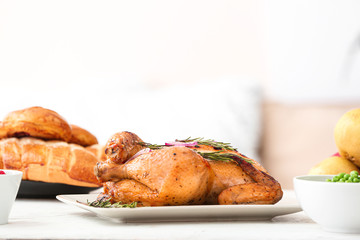 Tasty baked turkey for Thanksgiving day on table