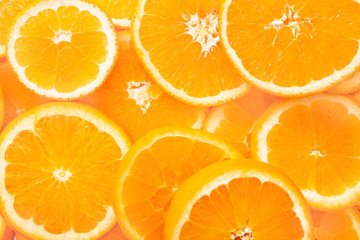 Sweet orange slices as background
