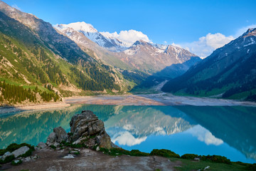 Big Almaty lake in the mountains.  Blurred water effect.  Ile-Alatau National Park.  Kazakhstan.