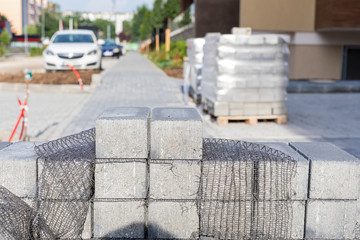 Cobblestone sidewalk in construction