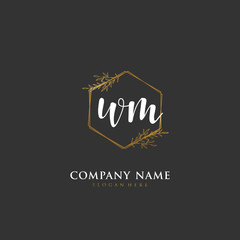 Handwritten initial letter W M WM for identity and logo. Vector logo template with handwriting and signature style.