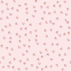 Seamless pattern with rose gold confetti hearts.