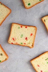 Slices of Pound dry fruit cake or bread. Indian Tutti Frutti bread, selective focus. with copy space