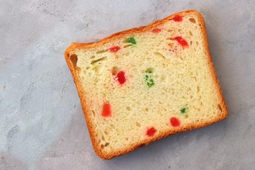 Slices of Pound dry fruit cake or bread. Indian Tutti Frutti bread, selective focus. with copy space