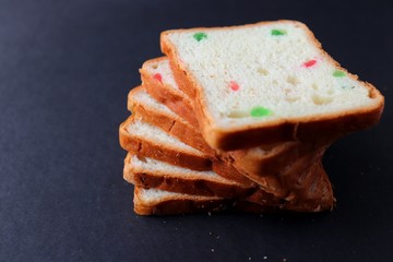 Slices of Pound dry fruit cake or bread. Indian Tutti Frutti bread, selective focus. with copy space
