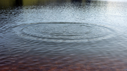Gentle wave pattern with bright reflections stock photo