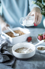 Cooking Homemade granola. woman is cook homemade granola. Selective focus.