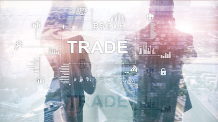 Stock trading candlestick chart and diagrams on blurred office center background.