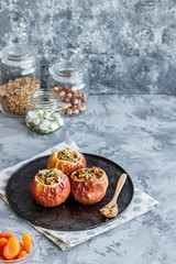 Baked apples with nut granola and pumpkin seeds.
