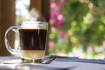 morning light  bokeh background with coffee cup 