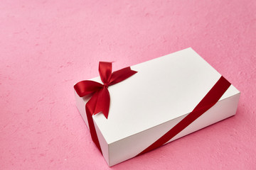 Valentines day gift box on pink background